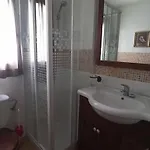 Acogedor En * دينايا