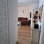 Acogedor En * دينايا