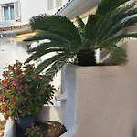 Acogedor En *