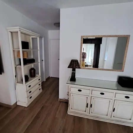 Acogedor En * دينايا