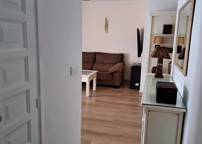 Acogedor En * دينايا