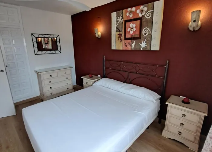 Acogedor En * دينايا